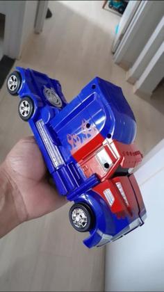 Imagem de Caminhão Carrinho Robô Com Sons E Luzes Bate E Volta
