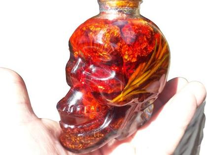 Imagem de Carolina reaper dessecada curtida no azeite com alecrim