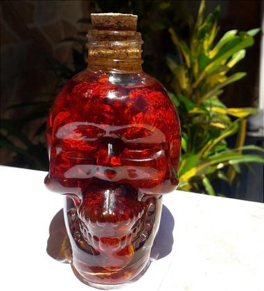 Imagem de Carolina reaper dessecada curtida no azeite com alecrim