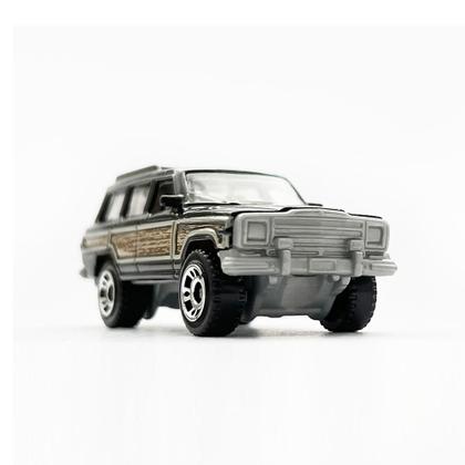 Imagem de Carrinho Hot Wheels Matchbox 89 Jeep Wagoneer Jurassic World