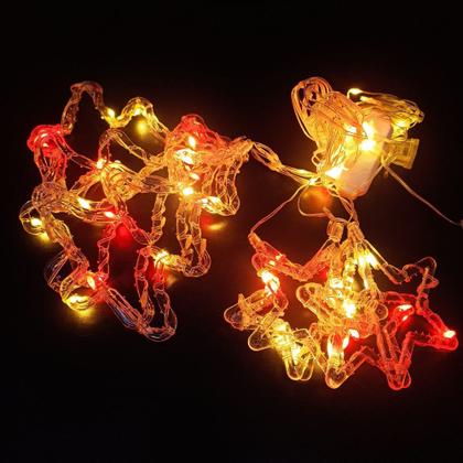 Cascata árvore com estrela colorido - bazar do saara Imagem de Cascata árvore com estrela colorido