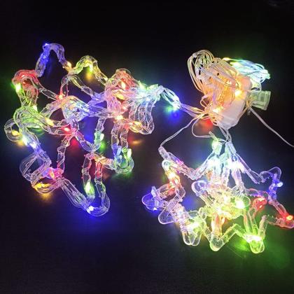 Cascata árvore com estrela colorido - bazar do saara Imagem de Cascata árvore com estrela colorido