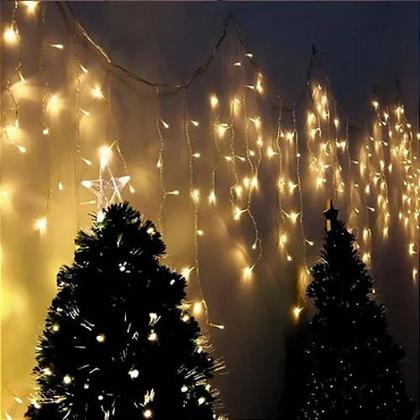 Imagem de Cascata Natal Pisca Fixo 400 Leds 9,5m Branco Quente 127V Uso Interno 14738-PL