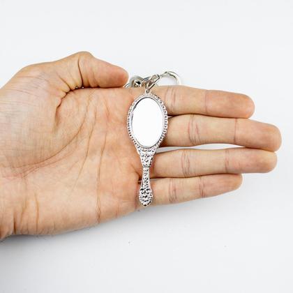 Imagem de Chaveiro Iemanjá Abebe Oval Espelho Prateado 16 cm Metal
