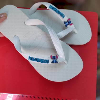 Imagem de Chinelo Havaianas Top Com Stitch Azul e Logo na Tira Feminino