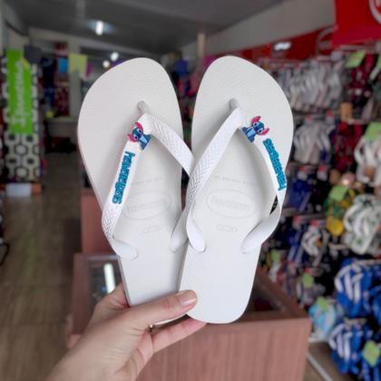 Imagem de Chinelo Havaianas Top Com Stitch Azul e Logo na Tira Feminino