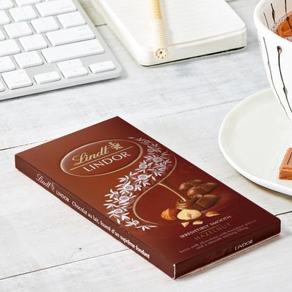 Imagem de Chocolate Lindt Lindor, Ao Leite com Avelã, Barra de 100g