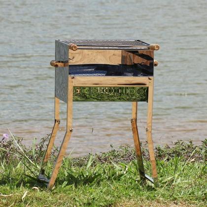 Imagem de Churrasqueira Inox Portatil Dobravel Fechada com Alça de Laterais e Grelha Inox I N1