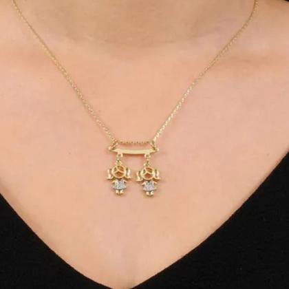 Imagem de Colar De Filhos Com 2 Pingentes Menino ou Menina com Pedras de Zircônia Banhado Ouro 18K Banho Antialérgico Marca Andréia Branco Acessórios