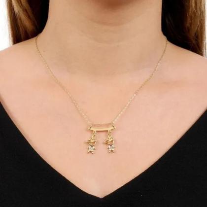 Imagem de Colar De Filhos Com 2 Pingentes Menino ou Menina com Pedras de Zircônia Banhado Ouro 18K Banho Antialérgico Marca Andréia Branco Acessórios