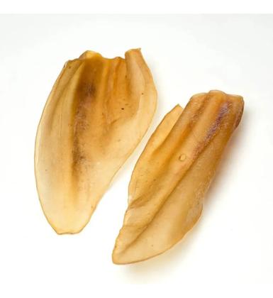 Imagem de Combo Modedor Petisco Natural Orelha Bovina Desidratadas E 1 Osso Fêmur Suino