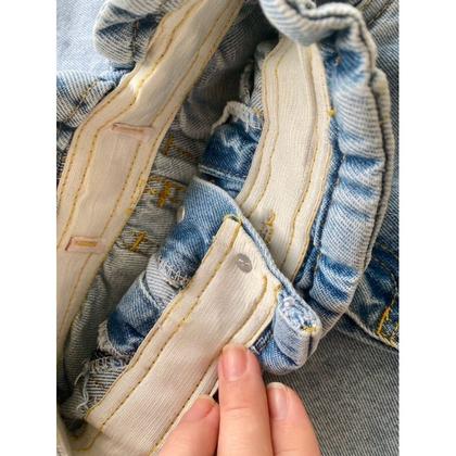 Imagem de CONJUNTO Short saia jeans + Camisa/blusa jeans LUXO