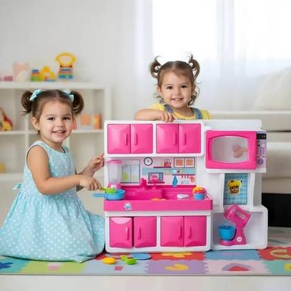 Imagem de Cozinha Infantil Rosa com Pia Armário e Vários Acessórios
