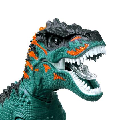 Imagem de Dinossauro T Rex Bota Ovo Anda C/ Som E Projetor De Luz 40cm -Dm Toys