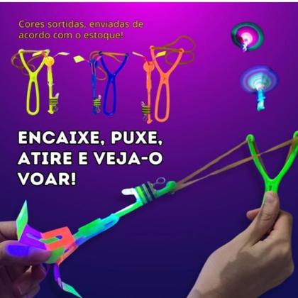 Imagem de Estilingue Com Luz De Led Voador Brinquedo Lançador