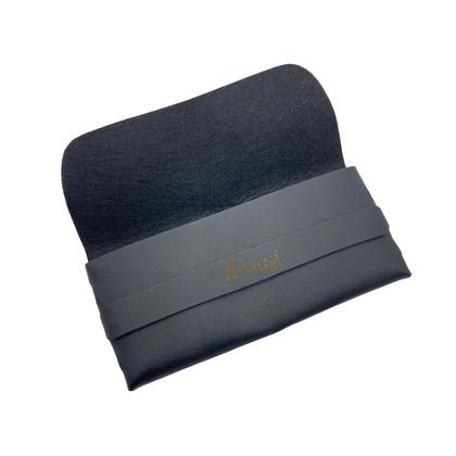 Imagem de Estojo formato carteira de material sintético