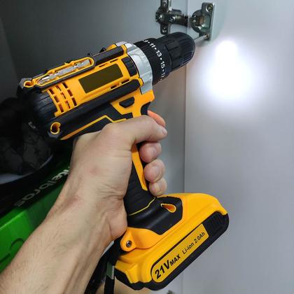 Imagem de Furadeira e Parafusadeira A Bateria 21v Max Sem Fio Bivolt Com Kit 26 Peças Maleta