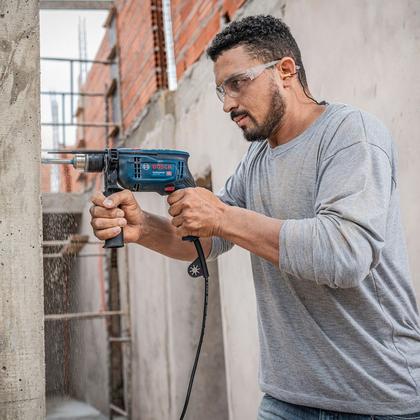 Imagem de Furadeira Parafusadeira de Impacto Bosch, 750W, 110V, com Kit 10 Brocas  Compacta, Reversível e Velocidade Variável  GSB 13 RE