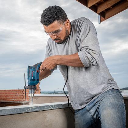 Imagem de Furadeira Parafusadeira de Impacto Bosch, 750W, 110V, com Kit 10 Brocas  Compacta, Reversível e Velocidade Variável  GSB 13 RE