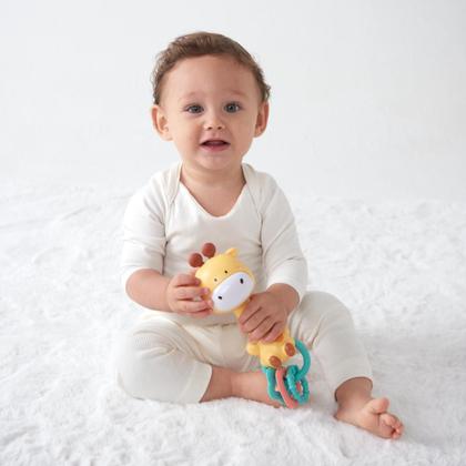 Imagem de Girafa Brinquedo Musical Com Luz e Sons Mordedor Buba Bebê Infantil