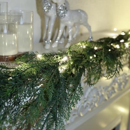 Imagem de Guirlanda de pinho de Natal OZFHUA 1,8 m com luzes para decoração