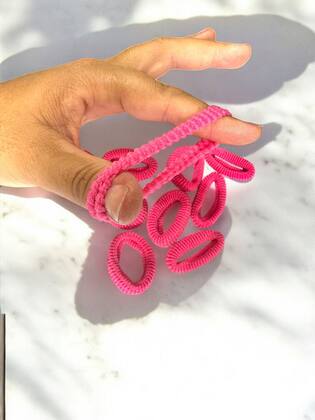 Imagem de Kit 150un Xuxinhas elásticos pequeno rosa p/ cabelo infantil