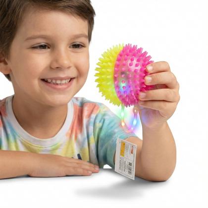 Imagem de Kit 36 Bolas Com Cravinho Luz E Apito Brinquedo Colorido Divertido Atacado Lembrancinha