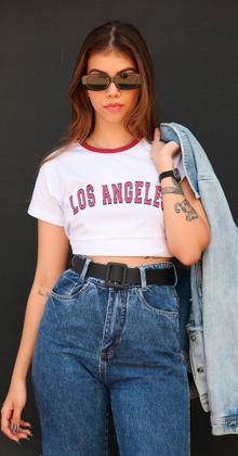 Imagem de KIT com 4 Camisetas femininas estampas e cores variadas.