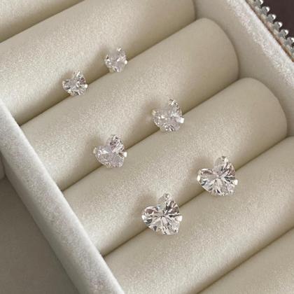 Imagem de Kit trio de prata brinco de coração com zircônias Prata legítima 925 ponto luz