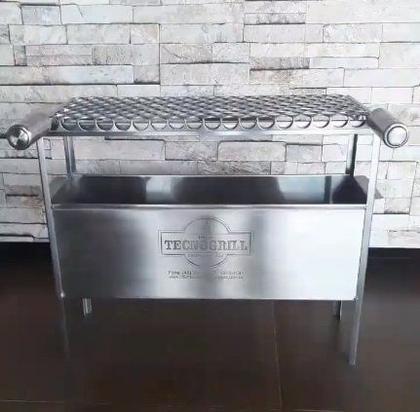 Imagem de Mini churrasqueira Tecnogrill em aço inox com grelha