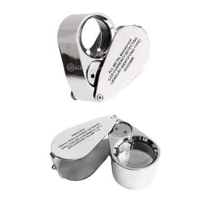 Imagem de Mini Lupa Dupla Aumento Para Joias Com LED Branco e UV 40x25mm Excelente Qualidade - 98909