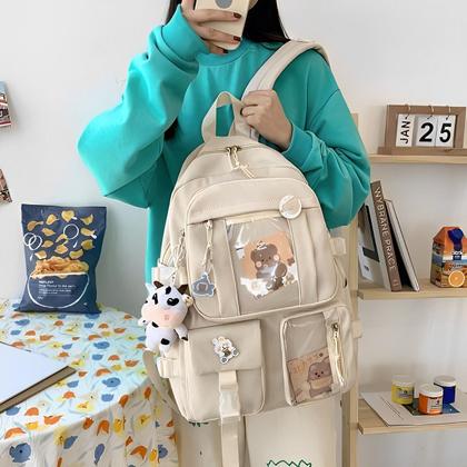 Imagem de Mochila Escolar Feminina Multicolorida Com Bolsos Transparentes Moderna Material Resistente Comporta Notebook e Livros