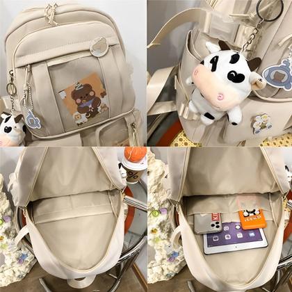 Imagem de Mochila Escolar Feminina Multicolorida Com Bolsos Transparentes Moderna Material Resistente Comporta Notebook e Livros