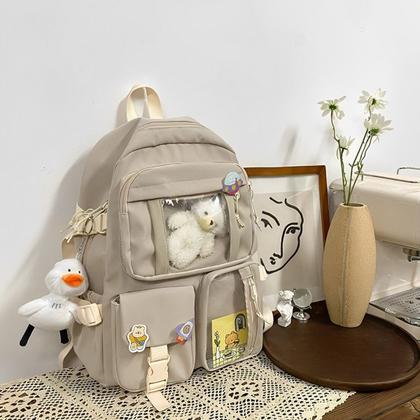 Imagem de Mochila Escolar Feminina Multicolorida Com Bolsos Transparentes Moderna Material Resistente Comporta Notebook e Livros