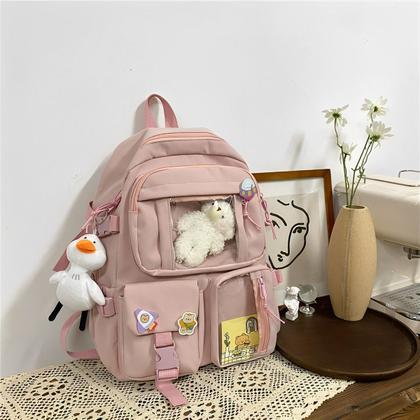 Imagem de Mochila Escolar Feminina Multicolorida Com Bolsos Transparentes Moderna Material Resistente Comporta Notebook e Livros