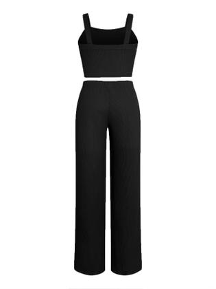 Imagem de Outfit: camisa curta feminina de malha canelada sem mangas e calças largas