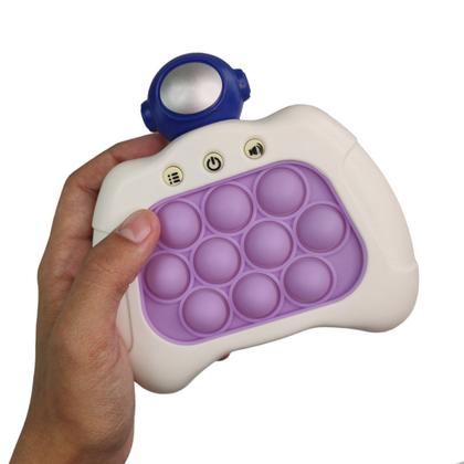 Imagem de Pop It Mini Game Fidget Sensorial 4 Modos Astronauta Luz Som Portatil Criança Jogo Ansiedade