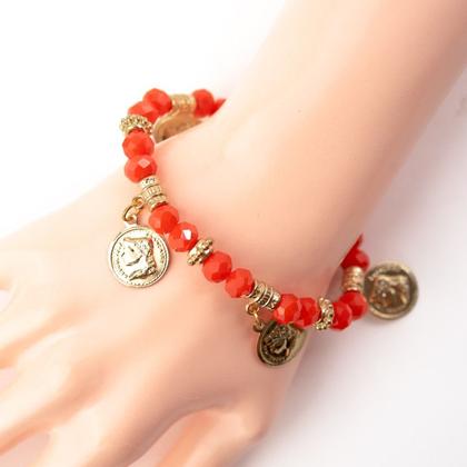 Imagem de Pulseira Cigana Laranja com Moedas Cristal e Silicone