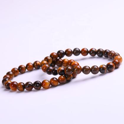 Imagem de Pulseira De Bolinha Pedras Naturais Olho De Tigre Unissex
