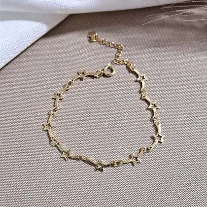 Imagem de Pulseira de Estrelas Douradas com Extensor - Semijoia Hipoalérgica