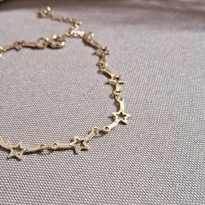 Imagem de Pulseira de Estrelas Douradas com Extensor - Semijoia Hipoalérgica