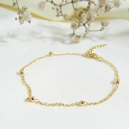 Imagem de Pulseira Feminina de Corrente Gourmet com 5 Bolinhas Pequenas - Banhada a Ouro 18k