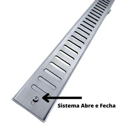 Ralo Linear Abre Fecha 5x70 Inox 304 Coletor Branco Sifonado Banheiro - Ficone & Reis Imagem de Ralo Linear Abre Fecha 5x70 Inox 304 Coletor Branco Sifonado Banheiro