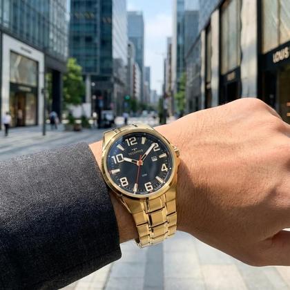 Imagem de Relógio Masculino Analógico de Pulso Dourado e Preto com Caixa e Pulseira de Aço Inoxidável à Prova D Água Luxo Casual e Social Technos