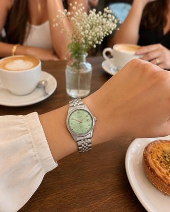 Imagem de Relógio Orient Feminino Analógico Eternal Aço Prata Mostrador Verde Calendário 32mm FBSS1206 F2SX