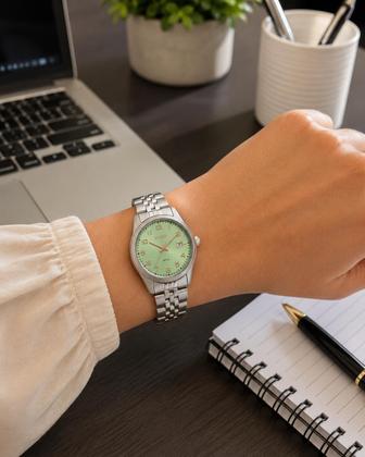 Imagem de Relógio Orient Feminino Analógico Eternal Aço Prata Mostrador Verde Calendário 32mm FBSS1206 F2SX