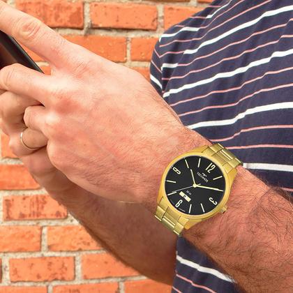 Imagem de Relógio Technos Masculino Dourado Preto Prova d'água com garantia de 1 ano com carteira