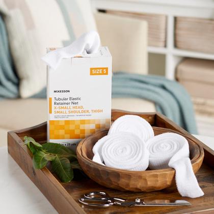 Imagem de Revestimento de rede de retenção elástico tubular McKesson tamanho 5
