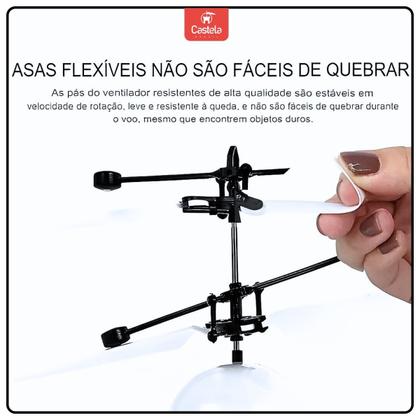 Imagem de Robo Branco Brinquedo Voador Sensor De Mão Luz Robô Que Voa Castela