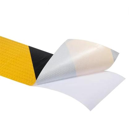 Imagem de Rolo Fita Adesiva Refletiva Zebrada Amarela Preta